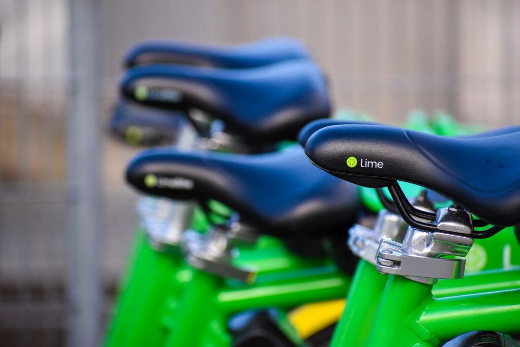 Lime bicycle parked on street