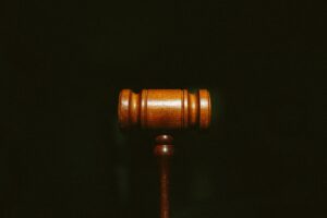 brown wooden stand with black background