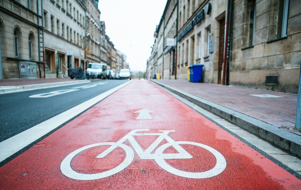 red and white love print on road