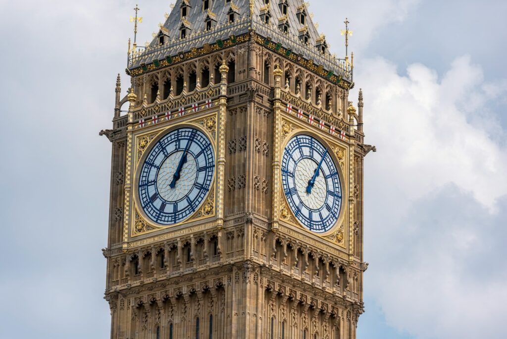 a tall clock tower with a sky background